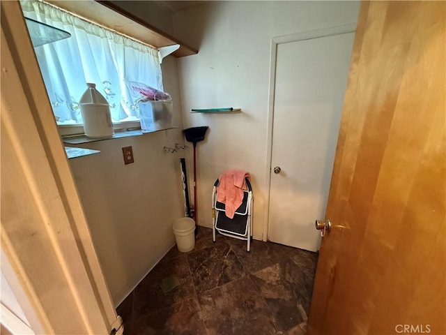 4271 Hines Ave, Riverside, CA 92505 - laundry area featuring stone finish flooring