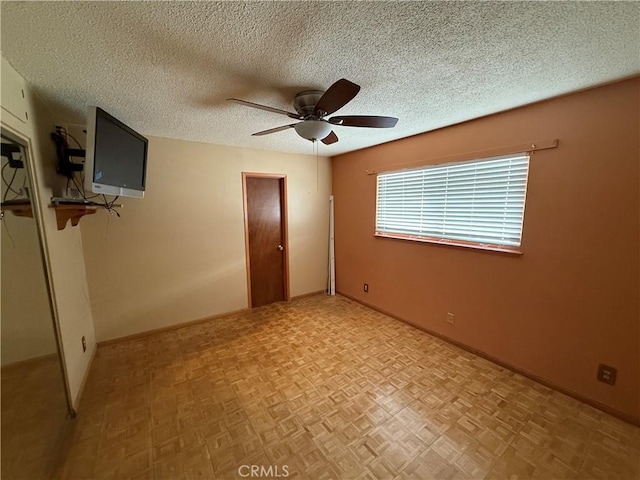 4271 Hines Ave, Riverside, CA 92505 - unfurnished bedroom with a textured ceiling and ceiling fan