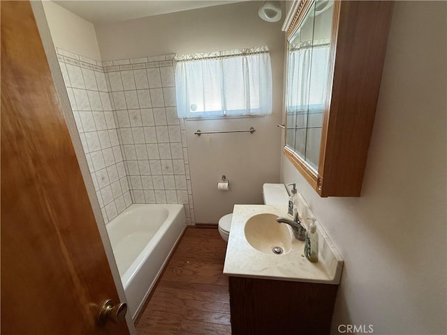4271 Hines Ave, Riverside, CA 92505 - bathroom featuring wood finished floors, vanity, and tub / shower combination
