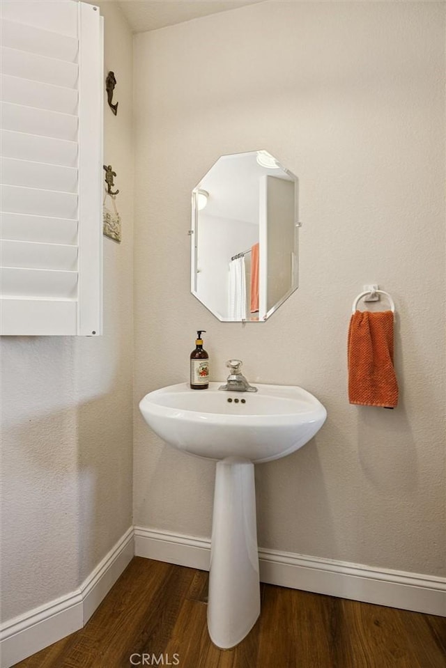 9230 Las Lomas Ave, Atascadero, CA 93422 - bathroom with baseboards and wood finished floors