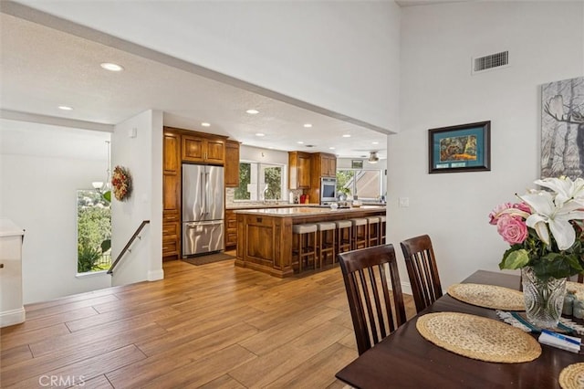 9230 Las Lomas Ave, Atascadero, CA 93422 - dining space featuring wood finished floors and recessed lighting