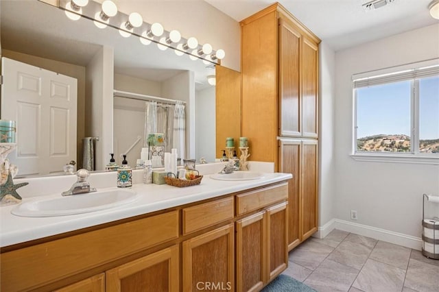 9230 Las Lomas Ave, Atascadero, CA 93422 - bathroom featuring double vanity and a shower with curtain