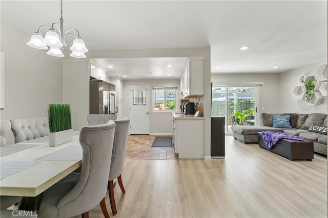 4783 Larwin Ave, Cypress, CA 90630 - dining area featuring recessed lighting, a chandelier, and light wood-type flooring