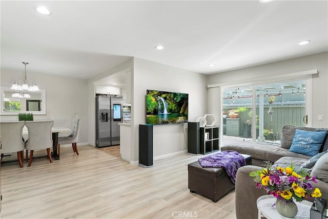 4783 Larwin Ave, Cypress, CA 90630 - living area featuring light wood-type flooring, a chandelier, and recessed lighting