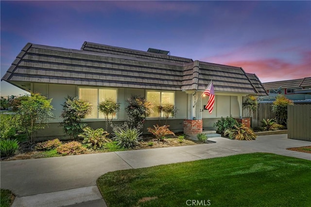 4783 Larwin Ave, Cypress, CA 90630 - view of front of house featuring mansard roof and stucco siding