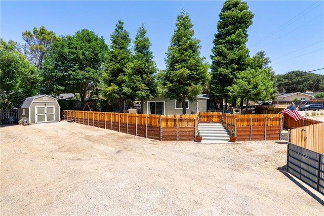 4095 Dolores Ave, Atascadero, CA 93422 - view of property hidden behind natural elements featuring a storage unit
