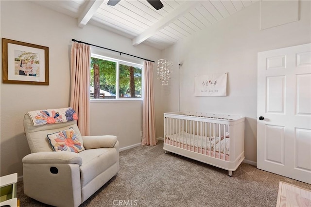 4095 Dolores Ave, Atascadero, CA 93422 - bedroom with a nursery area, carpet floors, ceiling fan, and a wooden ceiling with exposed beams