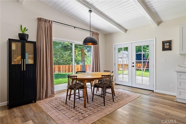 4095 Dolores Ave, Atascadero, CA 93422 - dining space with french doors, healthy amount of natural light, light wood-style floors, and wooden ceiling