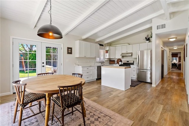 4095 Dolores Ave, Atascadero, CA 93422 - dining room featuring french doors, light wood-style floors, and plenty of natural light