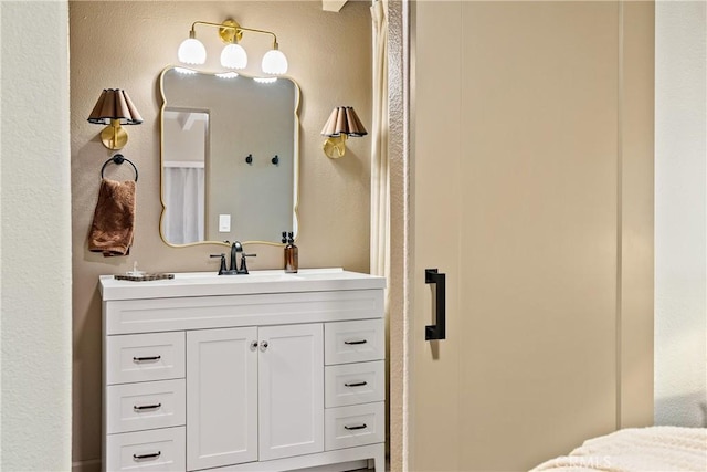 4095 Dolores Ave, Atascadero, CA 93422 - bathroom featuring vanity and a textured wall