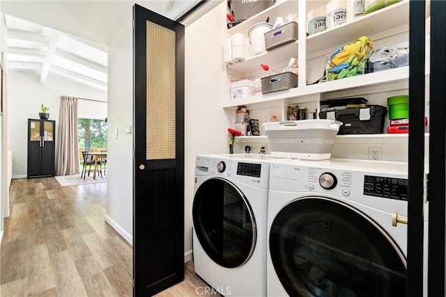 4095 Dolores Ave, Atascadero, CA 93422 - washroom with washer and clothes dryer and light wood-style flooring