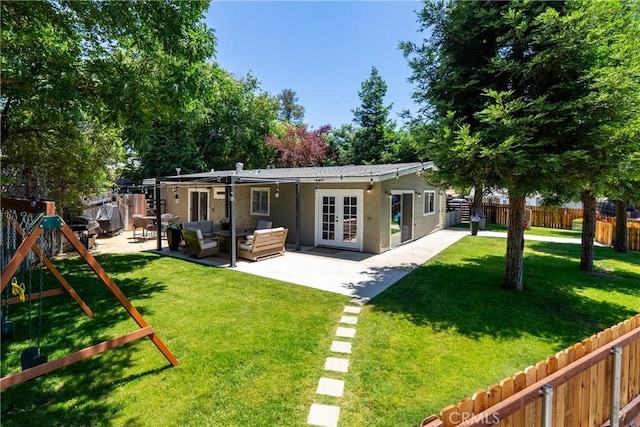 4095 Dolores Ave, Atascadero, CA 93422 - rear view of house featuring french doors, stucco siding, a patio, outdoor lounge area, and a fenced backyard
