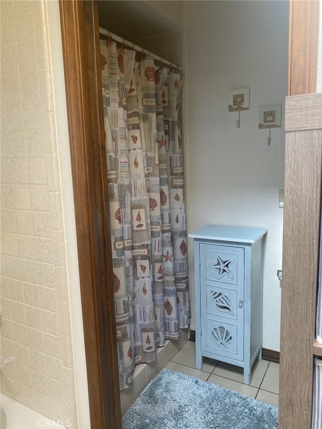 19824 Yucca Loma Rd, Apple Valley, CA 92307 - bathroom with tile patterned flooring and a shower with curtain