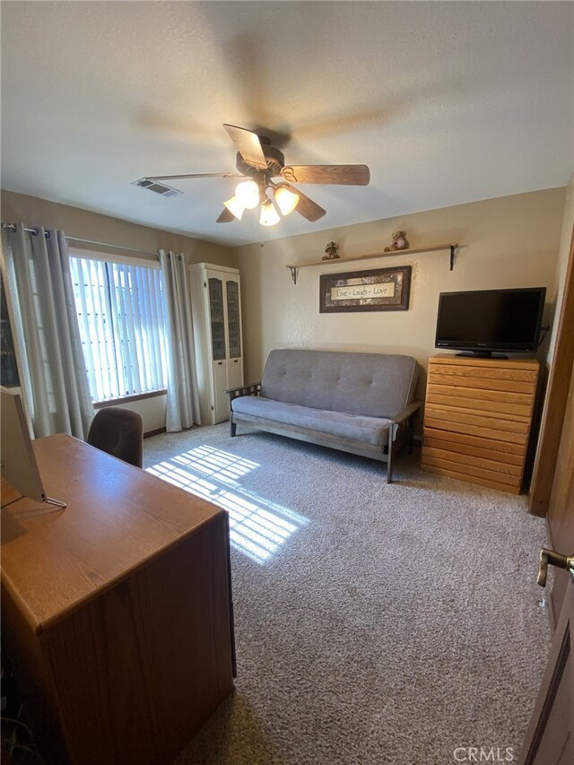 19824 Yucca Loma Rd, Apple Valley, CA 92307 - carpeted living room featuring a ceiling fan