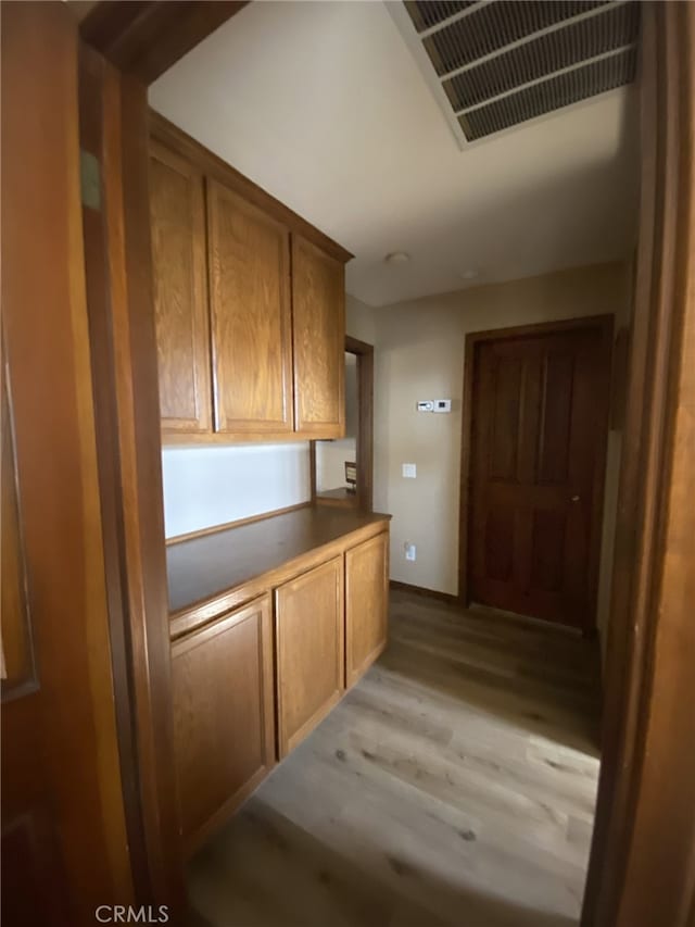19824 Yucca Loma Rd, Apple Valley, CA 92307 - hall with light wood-style flooring and baseboards