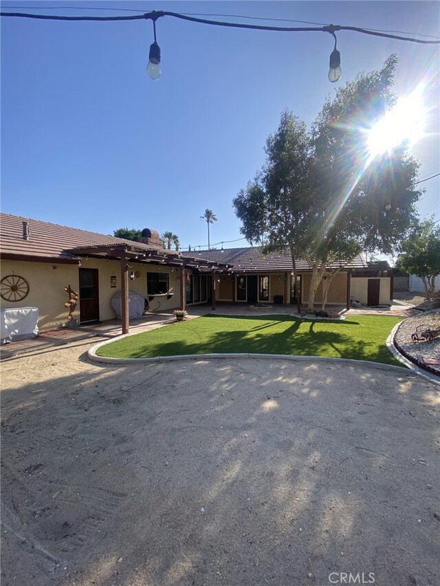 19824 Yucca Loma Rd, Apple Valley, CA 92307 - single story home with a front yard, a patio area, and stucco siding