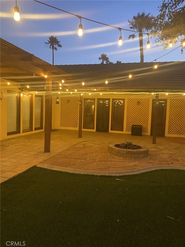 19824 Yucca Loma Rd, Apple Valley, CA 92307 - back of house with a patio area and a fire pit
