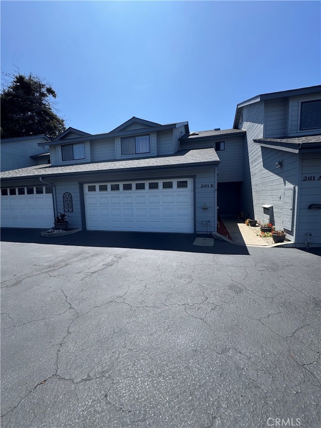 261 Spruce St Unit B, Arroyo Grande, CA 93420 - view of front of house featuring asphalt driveway