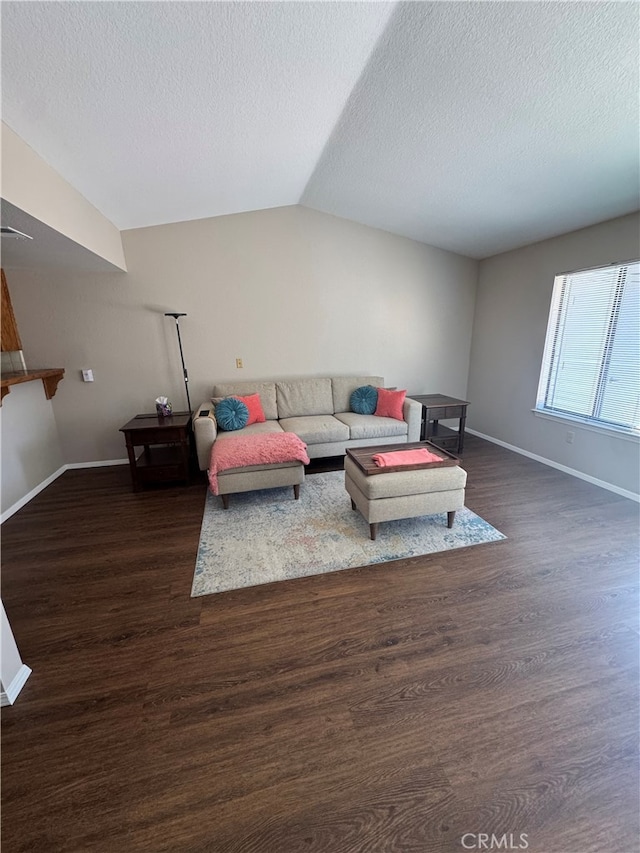 261 Spruce St Unit B, Arroyo Grande, CA 93420 - living room featuring dark wood-style floors, a textured ceiling, and vaulted ceiling