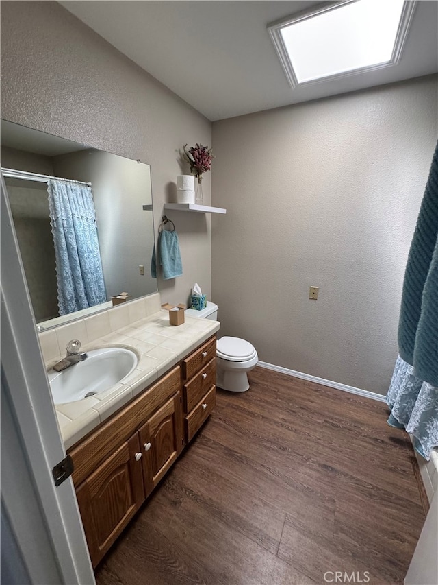 261 Spruce St Unit B, Arroyo Grande, CA 93420 - full bathroom featuring vanity, wood finished floors, and curtained shower