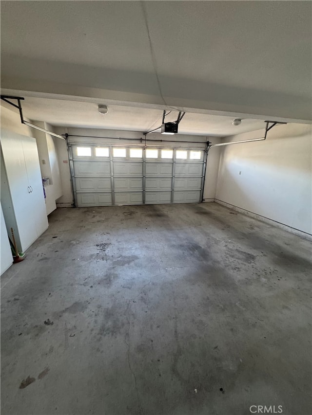 261 Spruce St Unit B, Arroyo Grande, CA 93420 - garage featuring a garage door opener