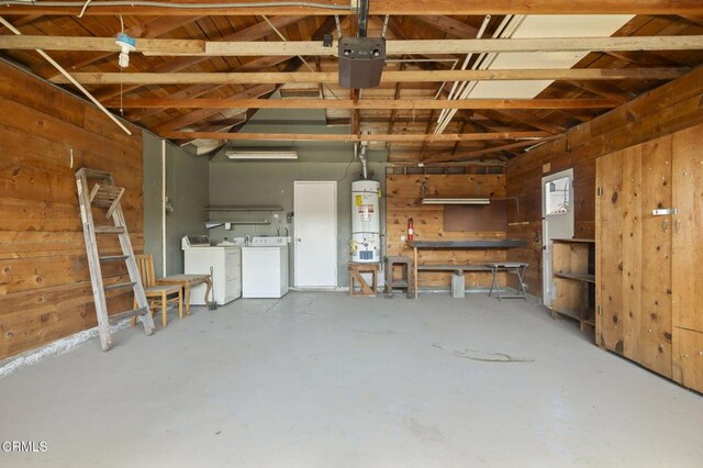 1543 Mobil Ave, Camarillo, CA 93010 - garage featuring washing machine and clothes dryer, secured water heater, wood walls, and a workshop area