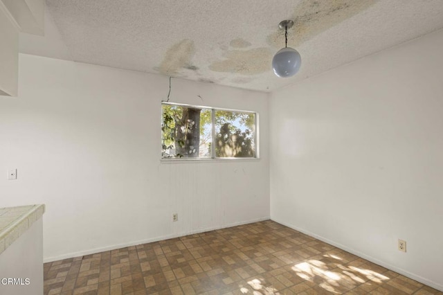 1543 Mobil Ave, Camarillo, CA 93010 - unfurnished room featuring a textured ceiling and baseboards