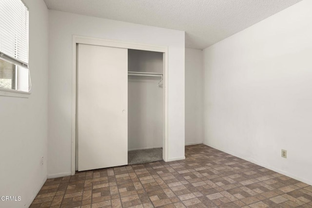 1543 Mobil Ave, Camarillo, CA 93010 - unfurnished bedroom featuring brick patterned flooring and a closet