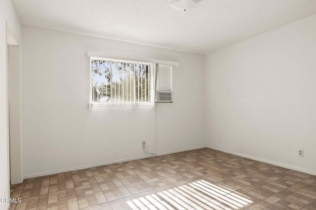 1543 Mobil Ave, Camarillo, CA 93010 - spare room with a textured ceiling and cooling unit