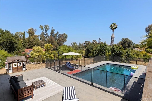 835 Minor Dr, Escondido, CA 92025 - view of swimming pool featuring an outbuilding, a patio area, and outdoor lounge area
