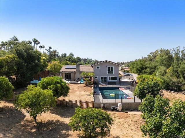 835 Minor Dr, Escondido, CA 92025 - rear view of house featuring solar panels, a fenced backyard, and a patio