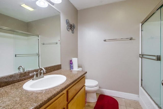 3635 Grove St Unit 268, Lemon Grove, CA 91945 - bathroom with vanity, tile patterned flooring, and bath / shower combo with glass door