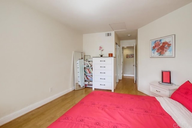 3635 Grove St Unit 268, Lemon Grove, CA 91945 - bedroom featuring attic access and wood finished floors