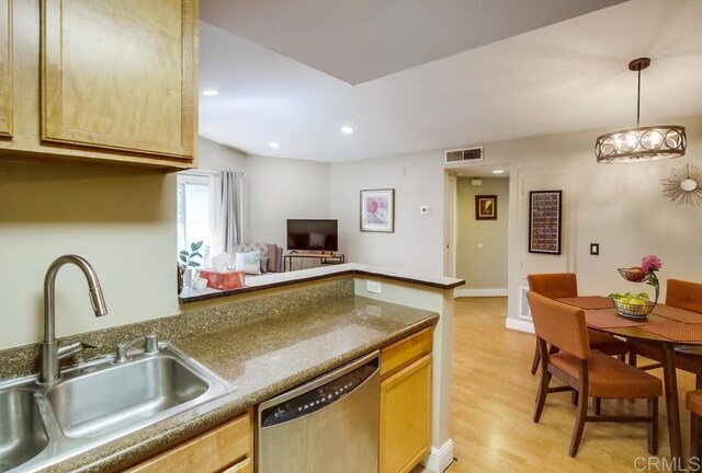 3635 Grove St Unit 268, Lemon Grove, CA 91945 - kitchen with stainless steel dishwasher, a peninsula, light wood-style flooring, recessed lighting, and decorative light fixtures