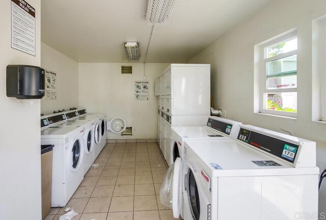 3635 Grove St Unit 268, Lemon Grove, CA 91945 - communal laundry room with stacked washer / drying machine, separate washer and dryer, and light tile patterned floors
