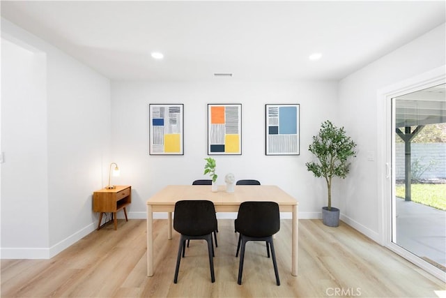 18746 Welby Way, Reseda, CA 91335 - dining space with light wood-style flooring and recessed lighting