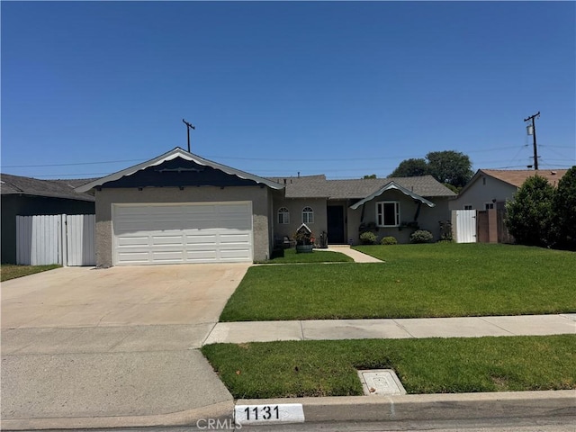 1131 W Beacon Ave, Anaheim, CA 92802 - ranch-style home with stucco siding, concrete driveway, and a garage