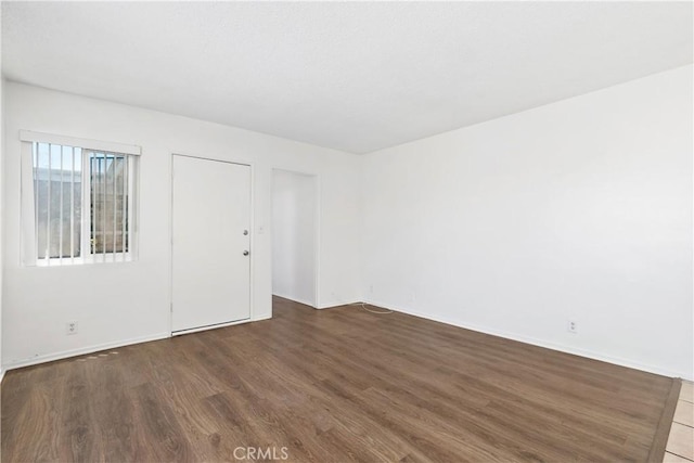 841 W 5th, San Pedro, CA 90731 - unfurnished room with wood finished floors and baseboards