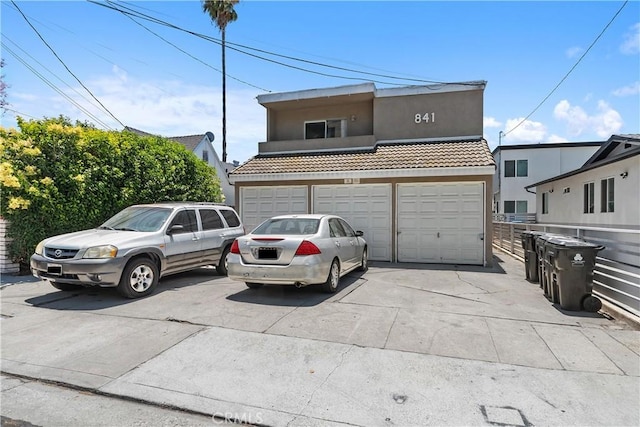 841 W 5th, San Pedro, CA 90731 - view of property with stucco siding and driveway