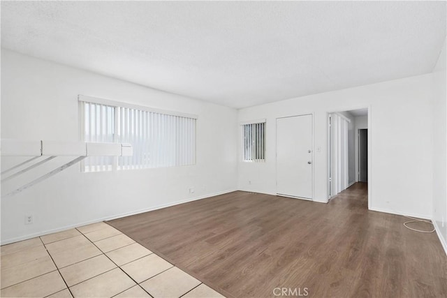 841 W 5th, San Pedro, CA 90731 - unfurnished room featuring healthy amount of natural light and wood finished floors