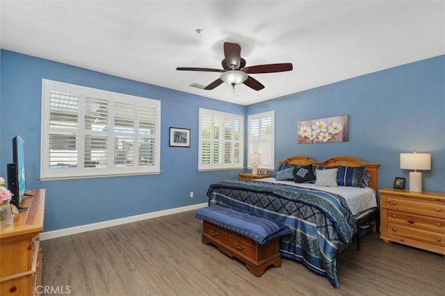1647 Naranjo Ct, Redlands, CA 92374 - bedroom with wood finished floors and a ceiling fan