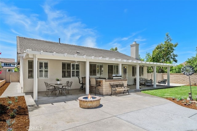 1647 Naranjo Ct, Redlands, CA 92374 - rear view of property with a patio, a pergola, an outdoor fire pit, a chimney, and a tile roof