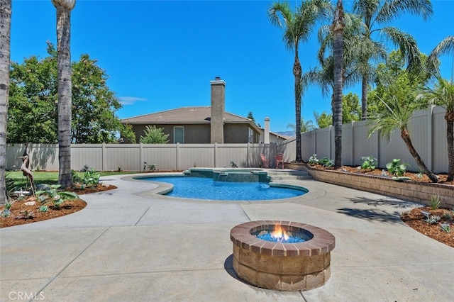 1647 Naranjo Ct, Redlands, CA 92374 - view of swimming pool with a fenced backyard, a patio area, a pool with connected hot tub, and a fire pit