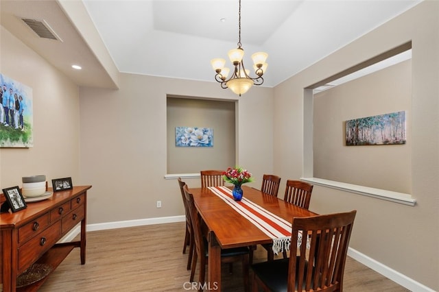1647 Naranjo Ct, Redlands, CA 92374 - dining room with light wood-style floors, a chandelier, and recessed lighting