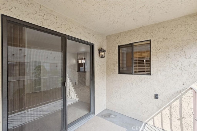 10166 Camino Ruiz Unit 32, San Diego, CA 92126 - doorway to property with stucco siding