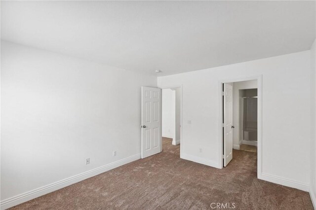 10166 Camino Ruiz Unit 32, San Diego, CA 92126 - unfurnished bedroom with carpet and baseboards