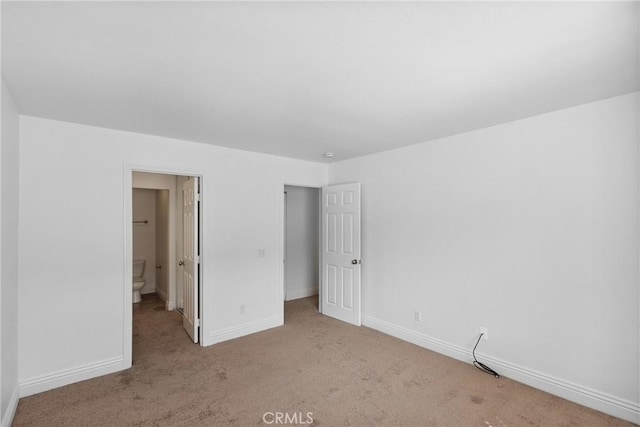 10166 Camino Ruiz Unit 32, San Diego, CA 92126 - unfurnished bedroom with carpet flooring and baseboards
