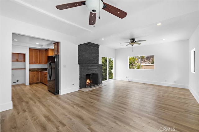1509 N Avenida De La Estrella, San Clemente, CA 92672 - unfurnished living room with ceiling fan, light wood-style floors, recessed lighting, and a fireplace