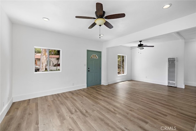 1509 N Avenida De La Estrella, San Clemente, CA 92672 - unfurnished living room featuring a heating unit, plenty of natural light, a ceiling fan, and recessed lighting