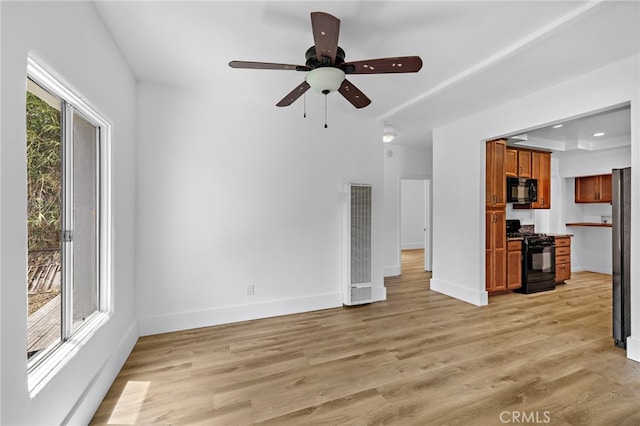 1509 N Avenida De La Estrella, San Clemente, CA 92672 - unfurnished living room featuring a heating unit, light wood-style flooring, ceiling fan, and recessed lighting